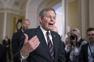 Sen. Steve Daines, R-Mont., speaks to reporters after the Republican leadership held a closed-door strategy session, at the Capitol in Washington, Tuesday, April 18, 2023. (AP Photo/J. Scott Applewhite)