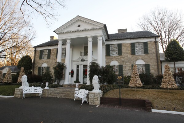 FILE - Graceland, Elvis Presley's home, is seen, Jan. 7, 2011, in Memphis, Tenn. A mysterious company has caused a stir for trying to auction Elvis Presley's Graceland in a foreclosure sale this week. A judge has blocked the sale after Presley's granddaughter filed a lawsuit alleging fraud. (AP Photo/Mark Humphrey, File)