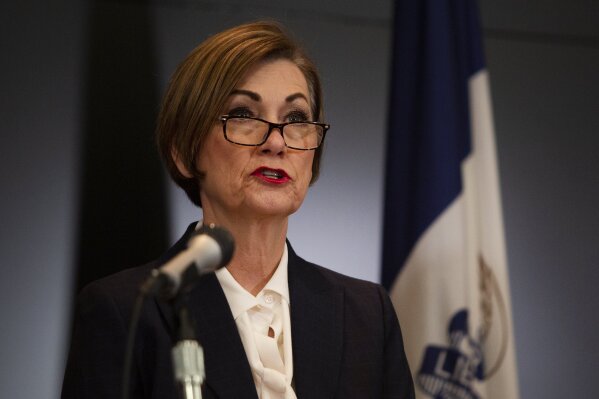 Iowa Gov. Kim Reynolds holds a news conference regarding COVID-19 at the State Emergency Operations Center in Johnston, Iowa, Monday, April 6, 2020. (Oliva Sun/The Des Moines Register via AP, Pool)