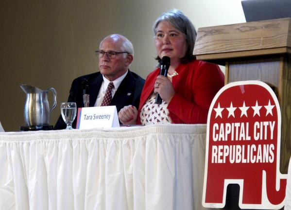 Republican Tara Sweeney, right, speaks Monday, May 16, 2022, at a forum in Juneau, Alaska, that was also attended by three other Republican candidates for Alaska's U.S. House seat, including John Coghill, left. Sweeney and Coghill are among 48 candidates in a June 11 special primary for the House seat left vacant by the death earlier this year of Republican Rep. Don Young. (AP Photo/Becky Bohrer)