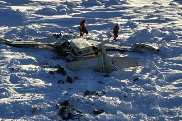 This photo provided by the U.S. Coast Guard on Feb. 7, 2025, shows a small commuter plane that crashed in western Alaska on a flight that was bound for the hub community of Nome. (U.S. Coast Guard via AP, File)