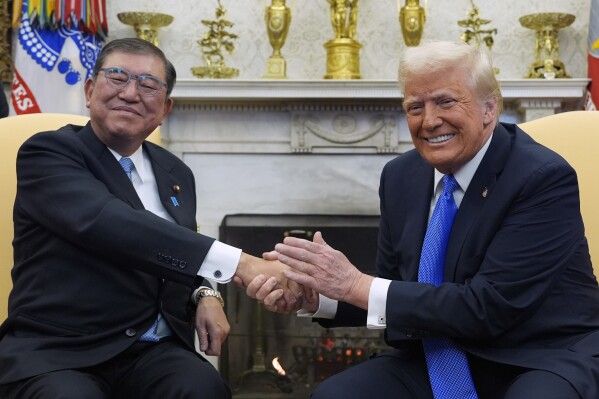 President Donald Trump meets with Japanese Prime Minister Shigeru Ishiba in the Oval Office of the White House, Friday, Feb. 7, 2025, in Washington. (AP Photo/Alex Brandon)