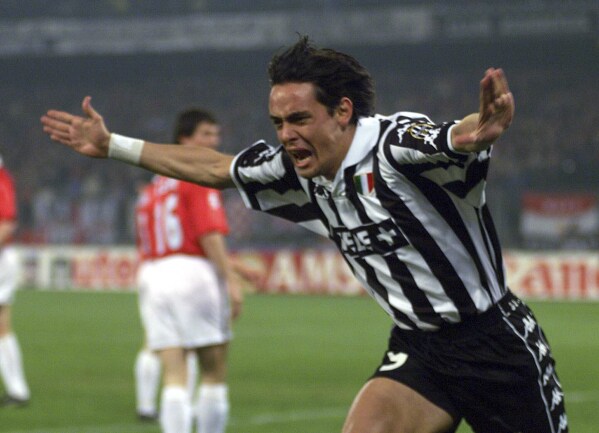 FILE - Juventus forward Filippo Inzaghi celebrates after scoring during the Champions League second leg, semifinal soccer match between Juventus and Manchester United, at the Delle Alpi stadium in Turin, April 21, 1999. World Cup-winning forward Filippo Inzaghi is back coaching in Serie A after being hired by Salernitana on Tuesday Oct. 10, 2023. (AP Photo/Luca Bruno, File)