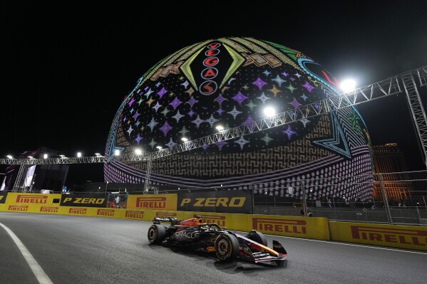Red Bull driver Max Verstappen, of the Netherlands, drives past the Sphere during the Formula One Las Vegas Grand Prix auto race, Saturday, Nov. 18, 2023, in Las Vegas. (AP Photo/Nick Didlick)