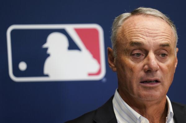 FILE - Major League Baseball Commissioner Rob Manfred speaks to reporters following an owners meeting at MLB headquarters in New York, June 16, 2022. Manfred says he feels “sorry for the fans in Oakland” about the Athletics’ plans to relocate to Las Vegas but denies claims by Oakland’s mayor that the franchise used negotiations with the city as leverage. Manfred discussed the plans Monday, April 24, 2023, during a meeting with the Associated Press Sports Editors, adding that he believes the last-place A's can field a more competitive team in Nevada.(AP Photo/Seth Wenig, File)