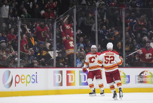 Toffoli scores 2nd goal in OT, Flames beat Canucks 5-4 - The San