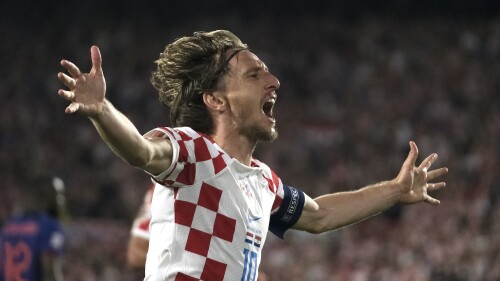 Croatia's Luka Modric celebrates after scoring his side's fourth goal against Netherlands during the Nations League semifinal soccer match between the Netherlands and Croatia at De Kuip stadium in Rotterdam, Netherlands, Wednesday, June 14, 2023. (AP Photo/Patrick Post)
