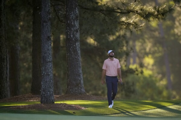 Scottie Scheffler walks to the green on the 17th hole during final round at the Masters golf tournament at Augusta National Golf Club Sunday, April 14, 2024, in Augusta, Ga. (AP Photo/Matt Slocum)