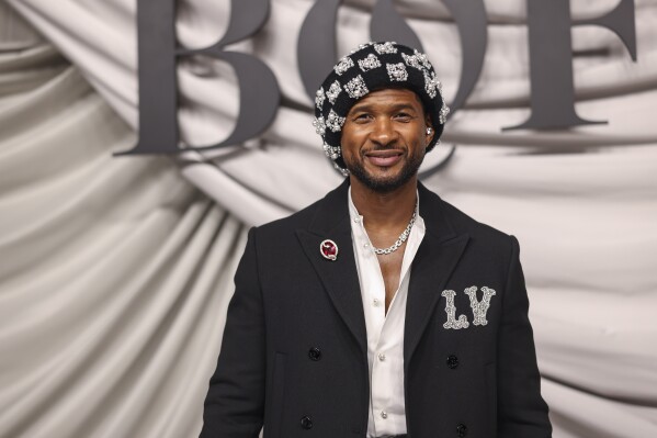 Usher arrives for the Business of Fashion 500 Gala Saturday, Sept. 30, 2023 in Paris. (AP Photo/Vianney Le Caer)
