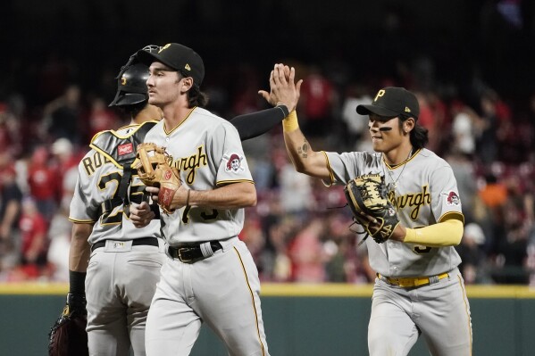 Pittsburgh Pirates' Andrew McCutchen gestures toward the dugout after  hitting a double during the sixth inning of the team's baseball game  against the St. Louis Cardinals Thursday, April 13, 2023, in St.