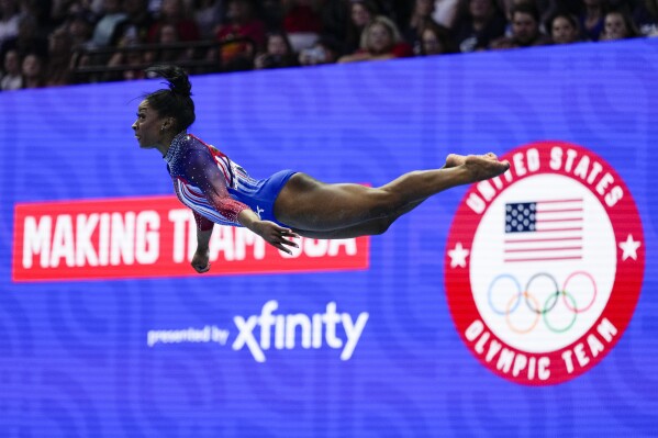 gymnast tan lines U.S. gymnast Simone Biles qualifies for Paris 2024 Olympics | AP News