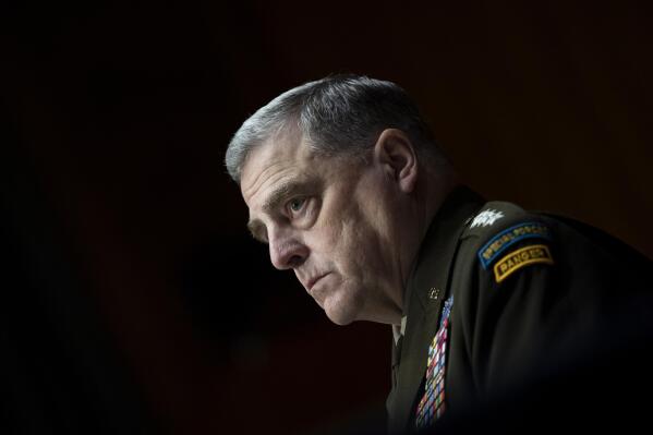 FILE - In this June 17, 2021, file photo Chairman of the Joint Chiefs Chairman Gen. Mark Milley testifies before a Senate Appropriations Committee hearing to examine proposed budget estimates and justification for fiscal year 2022 for the Department of Defense in Washington. Milley is expected to face tough questioning on those and other issues when he testifies with Defense Secretary Lloyd Austin at a Senate hearing Tuesday, Sept. 28, and a House panel Wednesday, Sept. 29. (Caroline Brehman/Pool via AP, File)