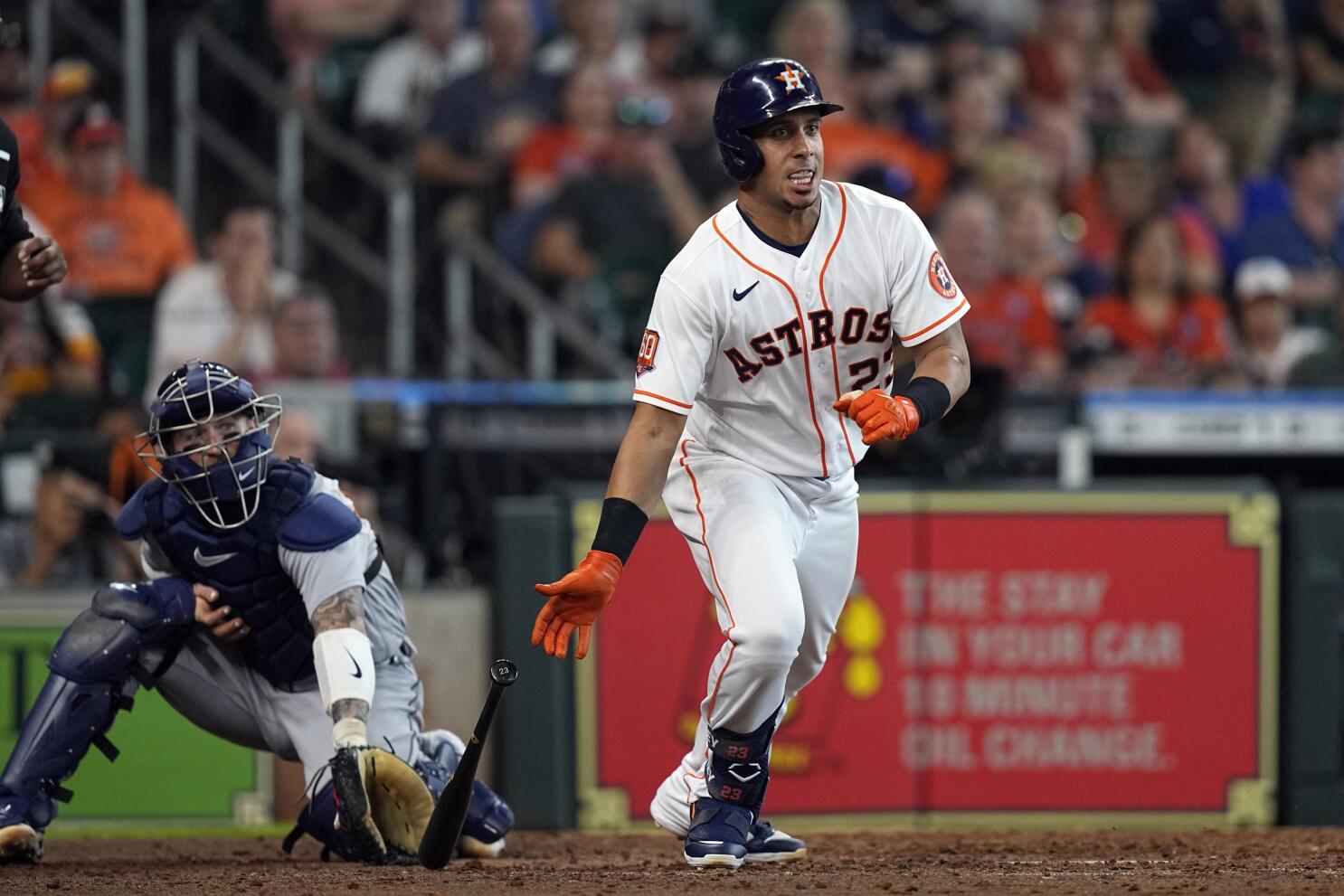 Jeremy Pena and Jose Altuve of the Houston Astros embrace after