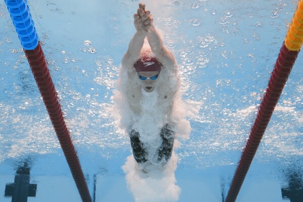 Duncan Scott of Britain competes in the men's 200-meter medley semifinal at the World Aquatics Championships in Doha, Qatar, Wednesday, Feb. 14, 2024. (AP Photo/Lee Jin-man)