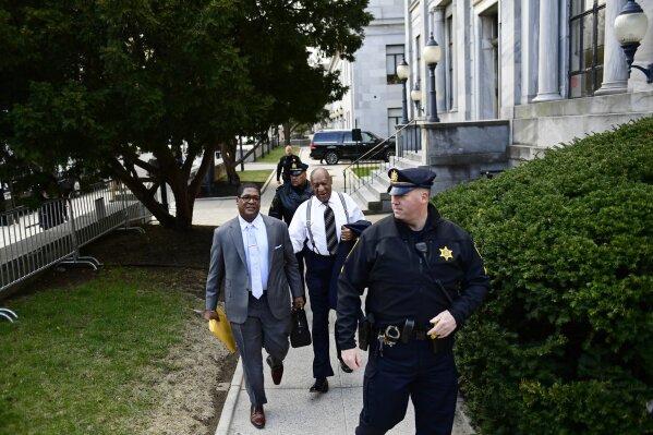 
              Bill Cosby, center, arrives with spokesperson Andrew Wyatt, left, for his sexual assault trial at the Montgomery County Courthouse, Thursday, April 5, 2018, in Norristown, Pa. (AP Photo/Corey Perrine)
            