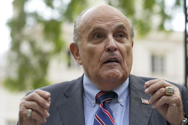 FILE - Former New York City mayor Rudy Giuliani speaks during a news conference on  June 7, 2022, in New York. Giuliani's lawyer says prosecutors in Atlanta have said Giuliani is a target of their criminal investigation into possible illegal attempts by then-President Donald Trump and others to interfere in the 2020 general election in Georgia. (AP Photo/Mary Altaffer, File)