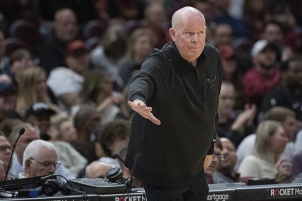 Charlotte Hornets head coach Steve Clifford directs his team during the second half of an NBA basketball game against the Cleveland Cavaliers in Cleveland, Sunday, April 14, 2024. (AP Photo/Phil Long)