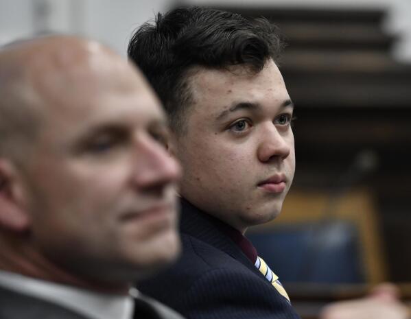 Kyle Rittenhouse, right, and his attorney Corey Chirafisi listen during his trial  at the Kenosha County Courthouse in Kenosha, Wis., on Thursday, Nov. 11, 2021. Rittenhouse is accused of killing two people and wounding a third during a protest over police brutality in Kenosha, last year.  (Sean Krajacic/The Kenosha News via AP, Pool)