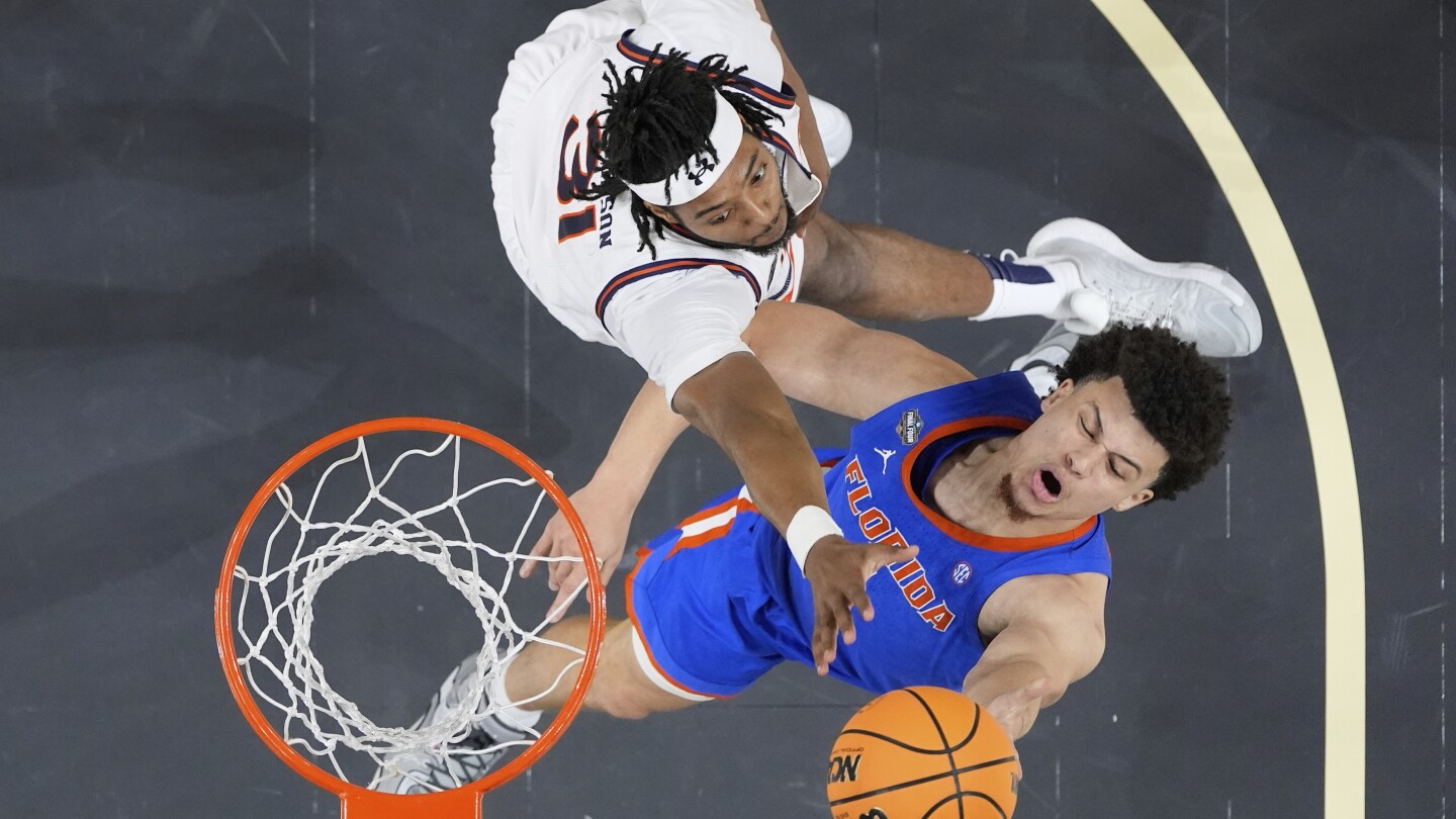 Clayton scores 34 points to help Florida beat Auburn 79-73 in Final Four to reach title game