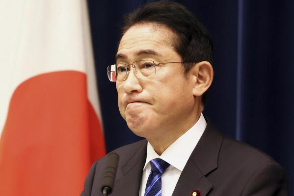 Japanese Prime Minister Fumio Kishida pauses for a moment as he speaks before media members at his official residence in Tokyo, Saturday, Dec. 10, 2022, after an extraordinary Diet session. (Yoshikazu Tsuno/Pool Photo via AP)