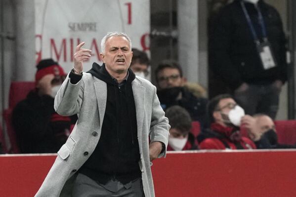 Roma's head coach Jose Mourinho reacts during the Serie A soccer match between AC Milan and Roma at the San Siro stadium, in Milan, Italy, Thursday, Jan. 6, 2022. (AP Photo/Antonio Calanni)