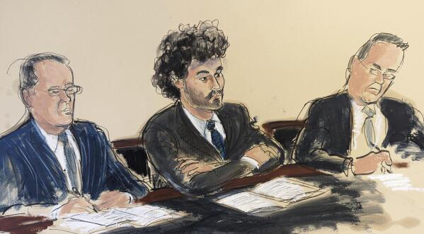 Samuel Bankman-Fried, center, sits in Manhattan federal court flanked by his attorneys Mark Cohen, left, and Christian Everdell, Thursday, Dec. 22, 2022, in New York. The cryptocurrency entrepreneur Sam Bankman-Fried can post a $250 million bond and live in his parents' California home while awaiting trial on charges that he swindled investors and looted customer deposits on his FTX trading platform, a judge said Thursday.(Courtroom sketch by Elizabeth Williams via AP)