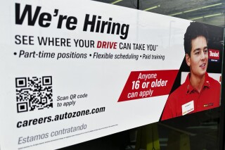 A hiring sign is displayed at a retail store in Wheeling, Ill., Sunday, Sept. 24, 2023. On Thursday, the Labor Department reports on the number of people who applied for unemployment benefits last week. (AP Photo/Nam Y. Huh)