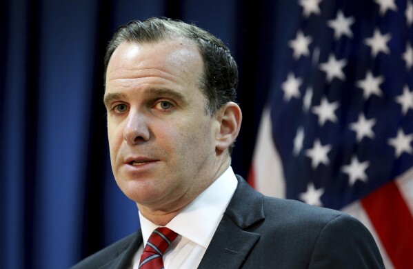 FILE - In this June 7, 2017, file photo, Brett McGurk, the U.S. envoy for the global coalition against IS, speaks during a news conference at the U.S. Embassy Baghdad, Iraq. In late November, the sides agreed to one-week cease-fire. Hamas released over 100 of the 250 hostages it was holding, mostly women and children, while Israel freed 240 Palestinian prisoners. The sides blamed each other for the failure to extend the deal, and fighting has worsened since then. The White House's national security spokesman, John Kirby, said Tuesday that a senior envoy, Brett McGurk, was in Cairo for talks on a "humanitarian pause" that would include a hostage deal. (AP Photo/Hadi Mizban, File)