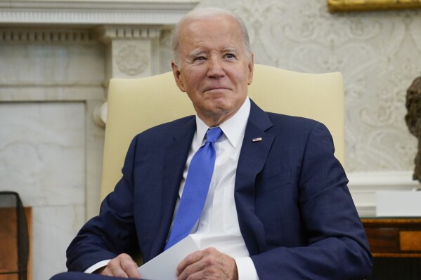 President Joe Biden listens as he meets with Dominican Republic's President Luis Abinader in the Oval Office of the White House, Thursday, Nov. 2, 2023, in Washington. (AP Photo/Evan Vucci)