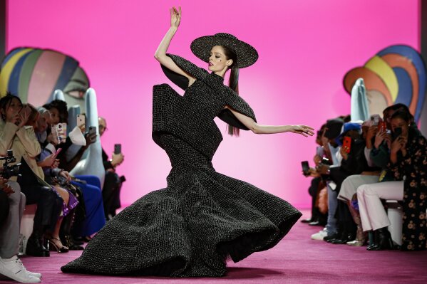 Model Coco Rocha wears the final look of the Christian Siriano collection during Fashion Week, Thursday, Feb. 6, 2020, in New York. (AP Photo/John Minchillo)