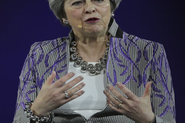 Former British Prime Minister Theresa May speaks at the Global Women's Forum in Dubai, United Arab Emirates, Monday, Feb. 17, 2020. (AP Photo/Kamran Jebreili)