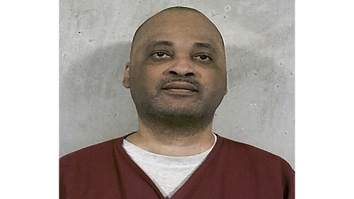 FILE - This Feb. 11, 2023, booking photo provided by the Oklahoma Department of Corrections shows death row inmate Jemaine Cannon. Oklahoma is preparing to execute Cannon on Thursday, July 20, 2023, for stabbing 20-year-old Sharonda Clark to death with a butcher knife in 1995 after his escape from a prison work center. In a statement sent to The Associated Press this week, Cannon's attorney, Mark Henricksen, said the state's decision to proceed with Cannon's execution amounts to historic barbarism. But prosecutors from the attorney general's office and Clark's adult daughters have urged the state to execute Cannon. (Oklahoma Department of Corrections via AP, File)
