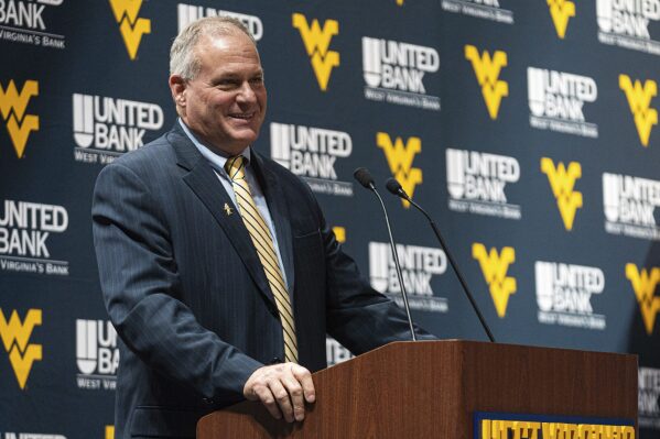 West Virginia coach Rich Rodriguez speaks during an introductory NCAA college football news conference Friday, Dec. 13, 2024, in Morgantown, W.Va. (Benjamin Powell/The Dominion-Post via AP, File)