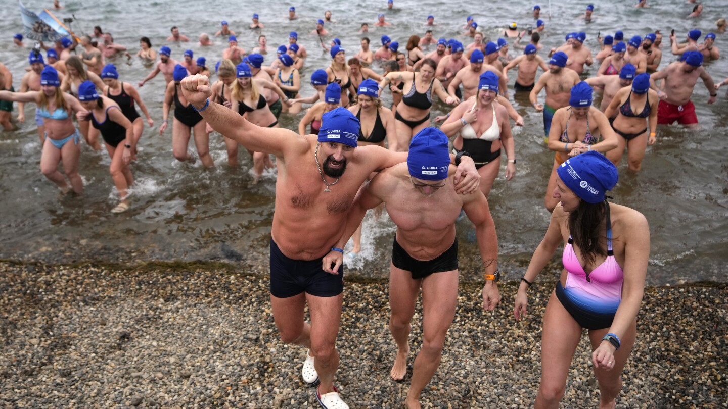 Cold-water swimmers in the Czech Republic set a new world record for the largest polar bear dip