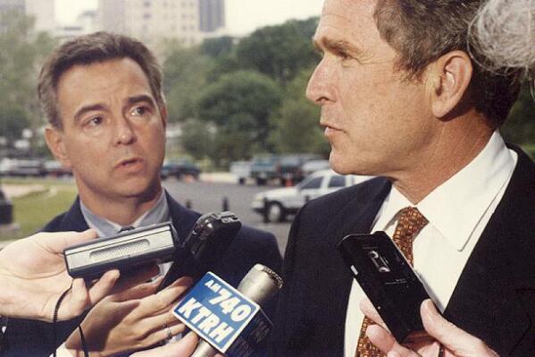 FILE - Wayne Slater, left, of The Dallas Morning News's Austin bureau, listens as George W. Bush responds to an answer during a 1997 availability in Austin, Texas. The retired Dallas Morning News Austin bureau chief and former The Associate Press reporter Slater, died Monday, Dec. 20, 2021, in an automobile accident in Williamson County. He was 74. (The Dallas Morning News via AP)
