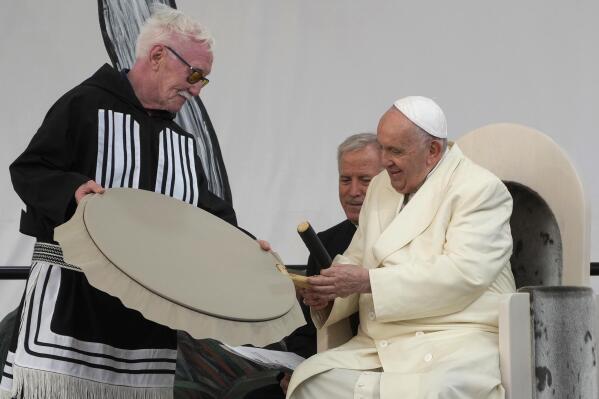 Pope Francis meets young people and elders at Nakasuk Elementary School Square in Iqaluit, Canada, Friday, July 29, 2022. Pope Francis travels to chilly Iqaluit, capital of northern Nunavut, to meet with Inuit Indigenous people, including school children and survivors of residential schools, in his final day in Canada. (AP Photo/Gregorio Borgia)