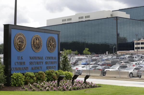 FILE - A sign stands at the National Security Administration (NSA) campus in Fort Meade, Md., June 6, 2013.  A former NSA employee is charged with trying to sell classified information to a foreign government. The Justice Department says 30-year-old Jareh Sebastian Dalke of Colorado Springs was arrested Wednesday after allegedly passing information to an undercover FBI agent he believed was a representative of an unnamed foreign government. (AP Photo/Patrick Semansky, File)