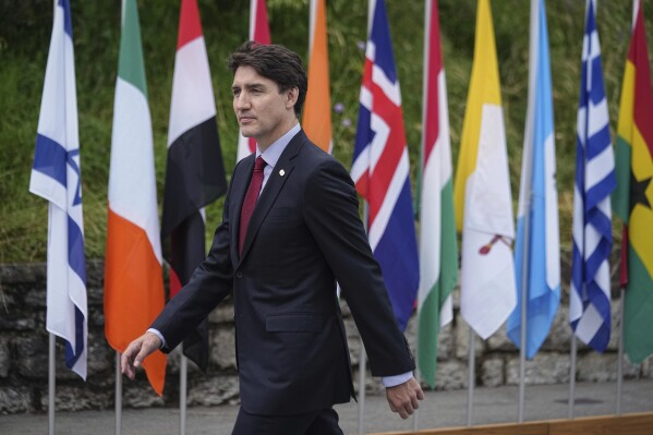 Canadian Prime minister Justin Trudeau arrives at the Ukraine peace summit in Obbürgen, Switzerland, Saturday, June 15, 2024. Switzerland is hosting scores of world leaders this weekend to try to map out the first steps toward peace in Ukraine. (AP Photo/Laurent Cipriani)