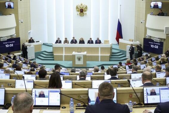 In this photo provided by The Federation Council of The Federal Assembly of The Russian Federation Press Service, Valentina Matviyenko, speaker of the Federation Council, Russian parliament's upper chamber, background center, leads the session of Federation Council of the Federal Assembly of the Russian Federation in Moscow, Russia, on Thursday, Dec. 7, 2023. Russian lawmakers have set the date of the 2024 presidential election for March 17, moving Vladimir Putin closer to a fifth term in office. (Federation Council of the Federal Assembly of the Russian Federation via 鶹ýapp)