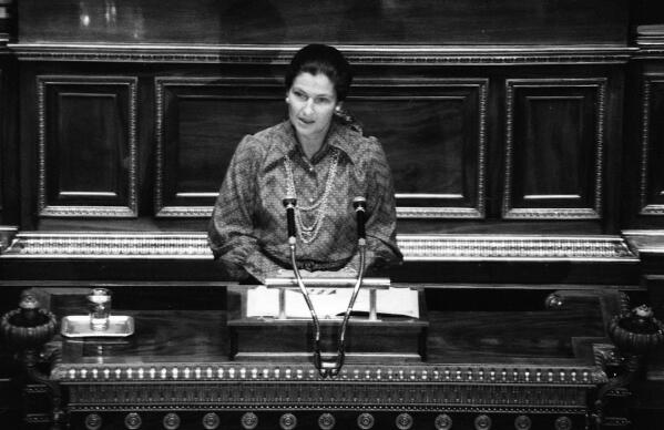 FILE - French Health Minister Simone Veil speaks about abortion law at the French National Assembly on Dec. 13, 1974 in Paris. Abortion was decriminalized under a 1975 law named for Simone Veil, a prominent legislator, former health minister and key feminist figure who championed it. The right to abortion in France has been inscribed in law for 47 years and enjoys broad support across the political spectrum. But more and more French women are asking: Could what happened in the U.S. happen here one day? (AP Photo/Eustache Cardenas, File)