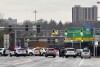 Law enforcement personnel block off the entrance to the Rainbow Bridge border crossing, Wednesday, Nov. 22, 2023, in Niagara Falls, N.Y. The border crossing between the U.S. and Canada has been closed after a vehicle exploded at a checkpoint on a bridge near Niagara Falls. The FBI's field office in Buffalo said in a statement that it was investigating the explosion on the Rainbow Bridge, which connects the two countries across the Niagara River. (AP Photo/Carolyn Thompson)