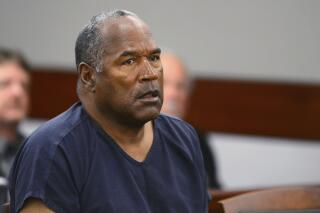FILE - In this May 14, 2013, file photo, O.J. Simpson appears at an evidentiary hearing in Clark County District Court in Las Vegas. On Friday, June 18, 2021, Simpson's lawyer says he'll keep fighting recent court orders in Nevada that the former football star owes least $60 million in judgments stemming from the 1994 killings of his ex-wife Nicole Brown Simpson and her friend, Ron Goldman. (Ethan Miller via AP, Pool, File)