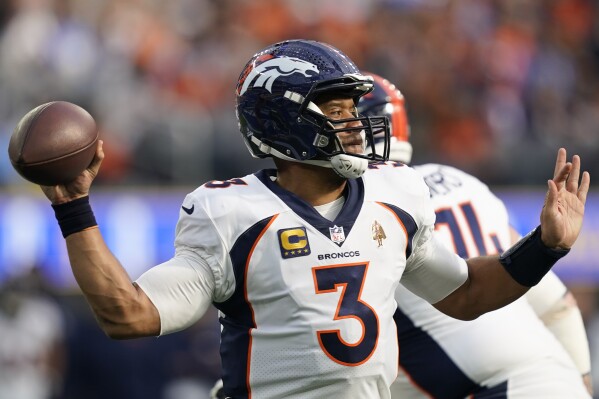 Denver Broncos quarterback Russell Wilson passes during the first half of an NFL football game against the Los Angeles Chargers, Sunday, Dec. 10, 2023, in Inglewood, Calif. (AP Photo/Ryan Sun)