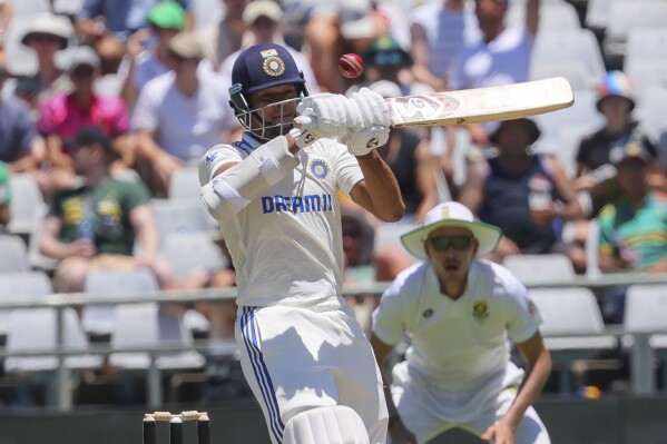 Yashasvi Jaiswal of India swings at a high bowl during the second day of the second test match between South Africa and India in Cape Town, South Africa, Thursday, Jan. 4, 2024. (AP Photo/Halden Krog)