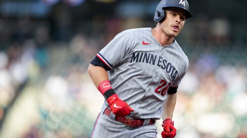 Minnesota Twins' Max Kepler runs the bases after hitting a solo home run against the Seattle Mariners during the fifth inning of a baseball game Wednesday, July 19, 2023, in Seattle. (AP Photo/Lindsey Wasson)