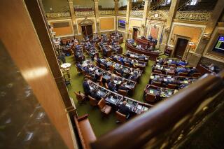 Lawmakers are shown in the House Chamber during a special session at the State Capitol in Salt Lake City on Wednesday, May 19, 2021. (Trent Nelson/The Salt Lake Tribune via AP)