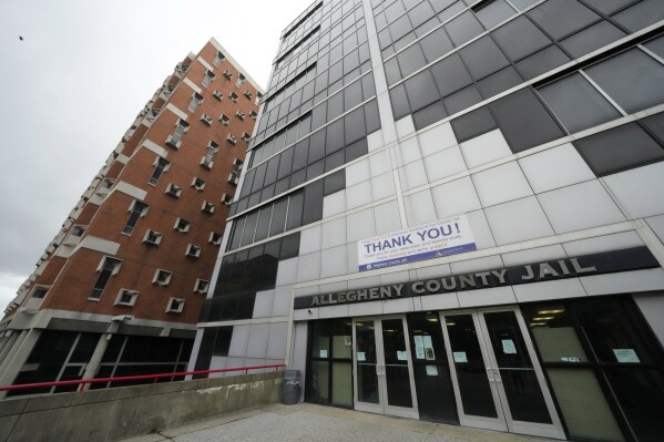 FILE - This Oct. 17, 2023 file photo shows the Allegheny County Jail in Pittsburgh. The Allegheny County jail could significantly increase its mental health staffing and provide more training about use of force and restraint after five inmates alleged that the Pennsylvania facility treats those with mental illness unfairly, under proposed settlement filed Tuesday, March 19, 2024. (AP Photo/Gene J. Puskar, File)