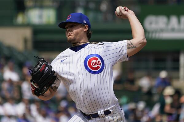 Chicago Cubs starting pitcher Justin Steele throws against the Milwaukee Brewers during the first inning of a baseball game in Chicago, Sunday, Aug. 21, 2022. (AP Photo/Nam Y. Huh)