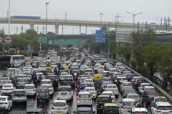 Vehicles are stuck in traffic on a highway near the Indira Gandhi International Airport after a heavy downpour disrupted vehicular movement in New Delhi, India, June 28, 2024. (AP Photo, File)