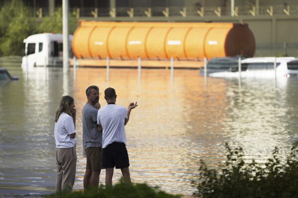 Dubai airport flooded in hours as storm dumps unusual record rain ...
